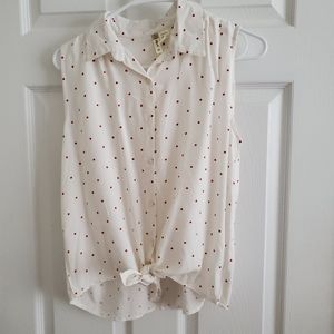 White poka dot shirt